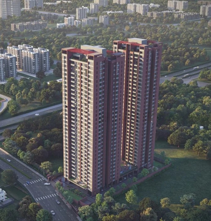 Photo of a residential high-rise development in progress, showing multiple floors under construction